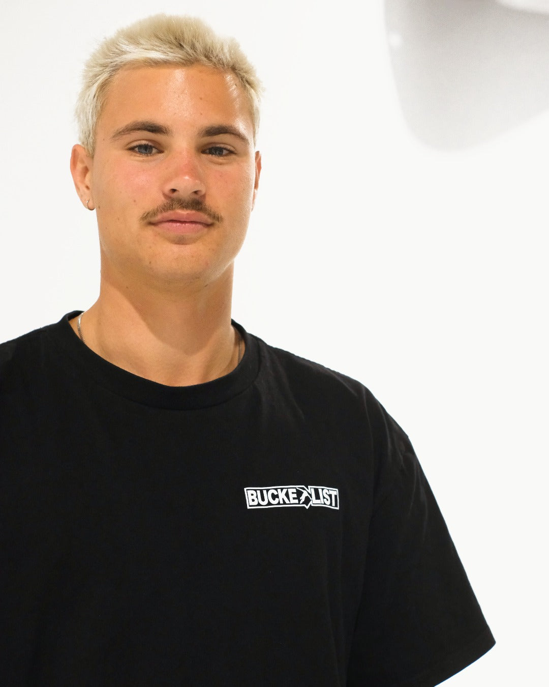 Spine Tee, chest logo close-up